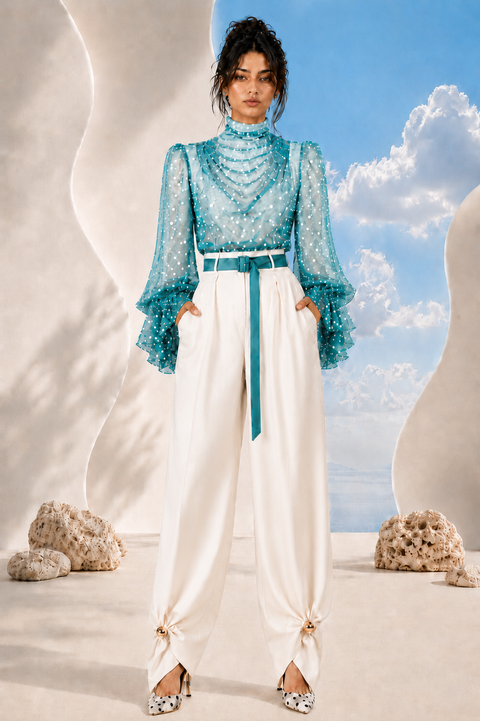 MAYA draped blouse and trouser set by Modella featuring printed chiffon, statement sleeves and tailored ivory trousers