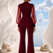 Back view of EVE burgundy jumpsuit by Modella featuring elegant tailoring and flowing silhouette