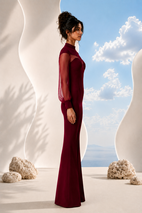 Side view of EVE burgundy jumpsuit by Modella showcasing fluid drape and tailored fit