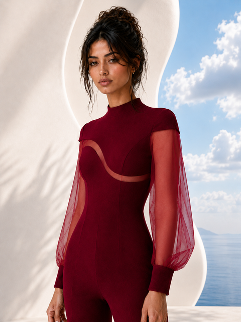 Three quarter view of EVE burgundy jumpsuit by Modella featuring sheer sleeves, sculpted tailoring and elegant modest eveningwear design