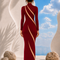 Back view of LILIA burgundy evening dress by Modella showcasing sculptural panel detailing and refined tailoring