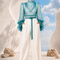 MAYA draped blouse and trouser set by Modella featuring printed chiffon, statement sleeves and tailored ivory trousers