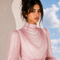 Close up view of MAYA Rose Edition by Modella featuring a draped neckline, printed chiffon and statement sleeves
