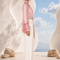 Side view of MAYA Rose Edition by Modella showcasing fluid draping and elegant modest tailoring