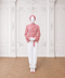 MAYA Rose modest blouse and white trouser set with draped polka print blouse and statement belt, front view by Modella