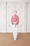 MAYA Rose modest blouse and white trouser set with draped polka print blouse and statement belt, front view by Modella