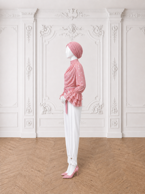 MAYA Rose modest blouse and white trouser set with layered ruffle sleeves and statement belt, side view by Modella