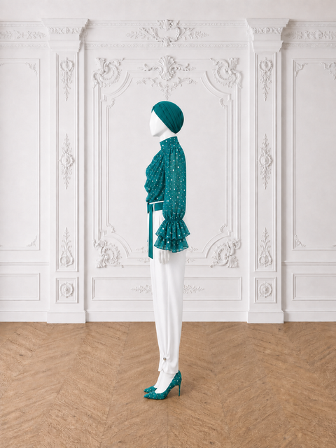 MAYA Teal luxury modest blouse and white tailored trouser set with polka print chiffon, layered ruffle cuffs and statement belt, side view by Modella