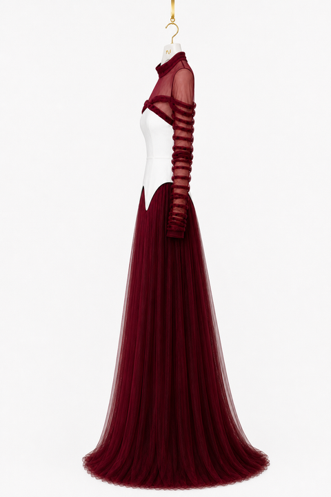 NYRA burgundy luxury modest evening gown with ivory sculpted corset, sheer ruched long sleeves and pleated floor-length skirt, hanger side view by Modella