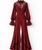 Front view of the VERA burgundy high-low jumpsuit by Modella featuring a sheer pleated high-neck yoke, fitted waist, long sleeves with sheer flared cuffs and dramatic flared legs