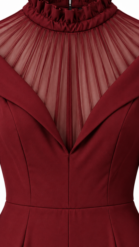 Close-up of the VERA burgundy jumpsuit by Modella featuring a sheer pleated tulle high-neck yoke, ruffled collar and sculpted fitted bodice
